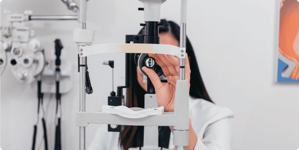 an ophthalmologist checking a slit lamp