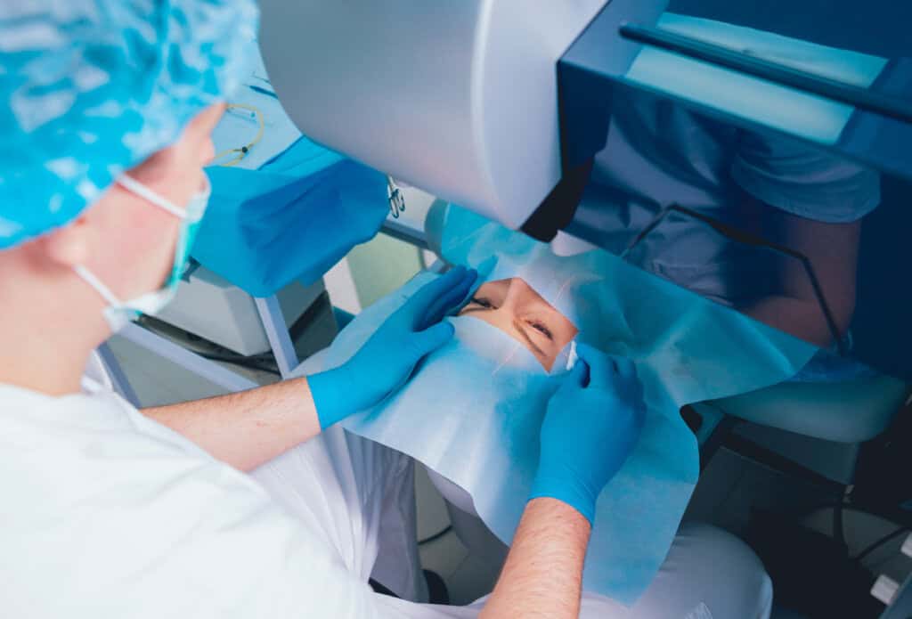 a doctor doing lasik to a patient