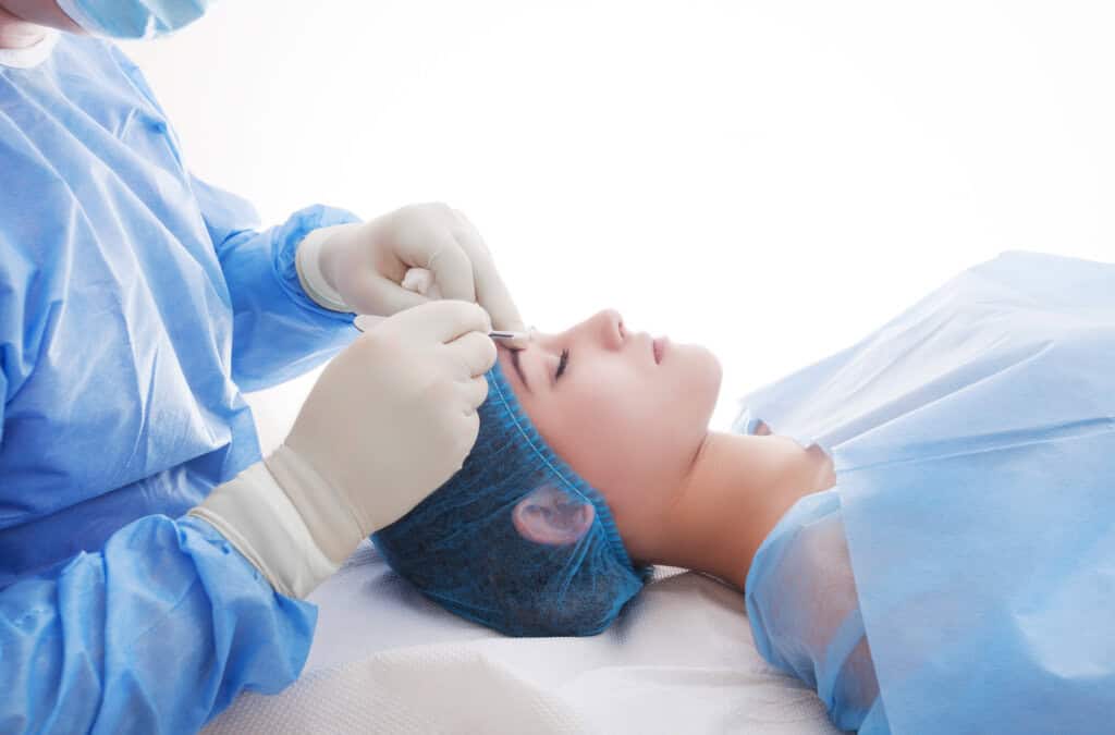 eyelid surgery being done by an ophthalmologist 