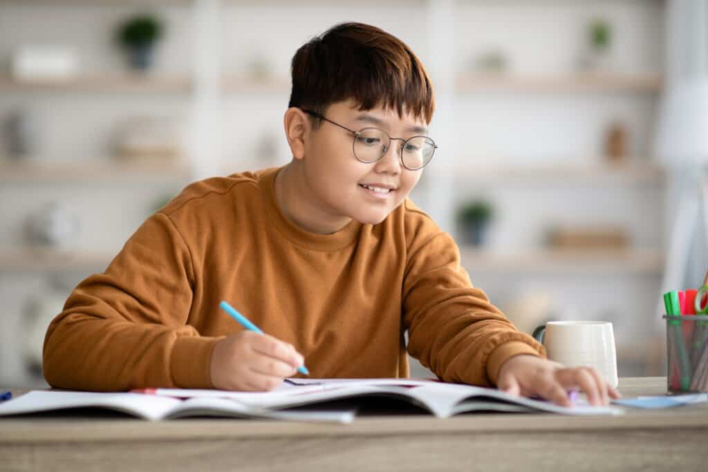 a boy wearing glasses